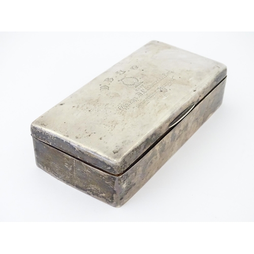 444 - A silver cigarette box with hinged lid and three sectional interior, hallmarked Birmingham 1904, mak... 