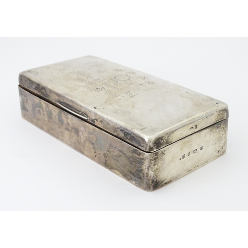 444 - A silver cigarette box with hinged lid and three sectional interior, hallmarked Birmingham 1904, mak... 