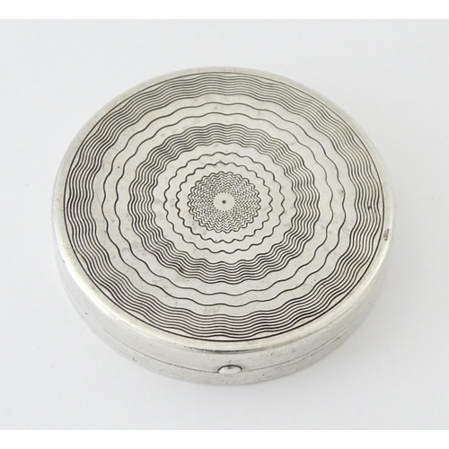 452 - An Art Deco silver compact with engine turned decoration and mirror to lid, hallmarked Birmingham 19... 