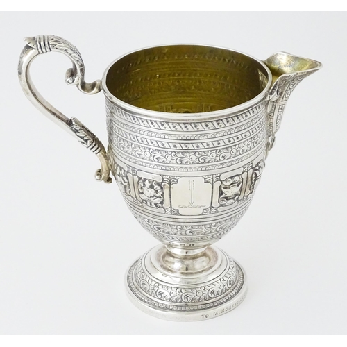 464 - A Victorian Scottish silver jug with banded decoration and Zodiac symbols, hallmarked Edinburgh 1892... 