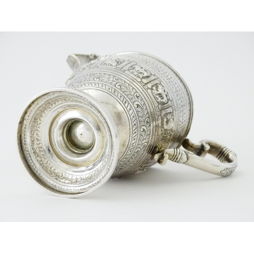 464 - A Victorian Scottish silver jug with banded decoration and Zodiac symbols, hallmarked Edinburgh 1892... 