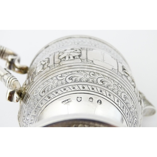 464 - A Victorian Scottish silver jug with banded decoration and Zodiac symbols, hallmarked Edinburgh 1892... 