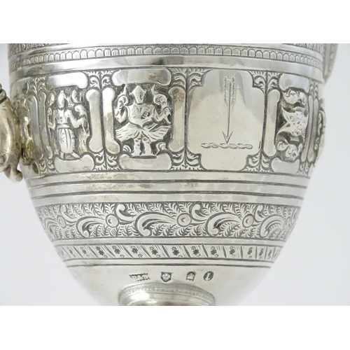 464 - A Victorian Scottish silver jug with banded decoration and Zodiac symbols, hallmarked Edinburgh 1892... 