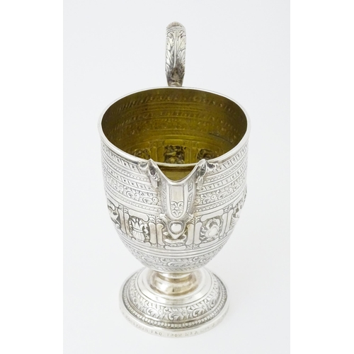 464 - A Victorian Scottish silver jug with banded decoration and Zodiac symbols, hallmarked Edinburgh 1892... 