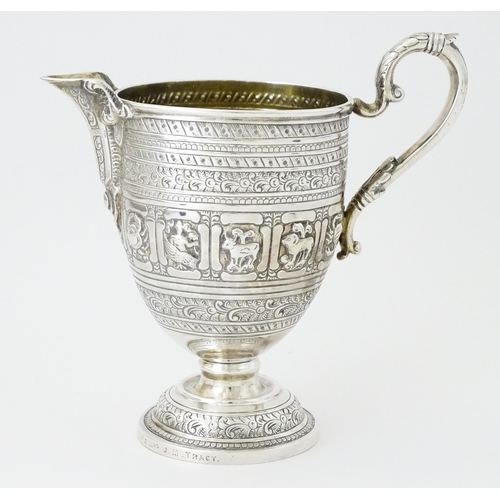 464 - A Victorian Scottish silver jug with banded decoration and Zodiac symbols, hallmarked Edinburgh 1892... 