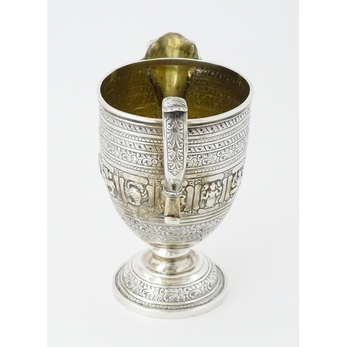 464 - A Victorian Scottish silver jug with banded decoration and Zodiac symbols, hallmarked Edinburgh 1892... 