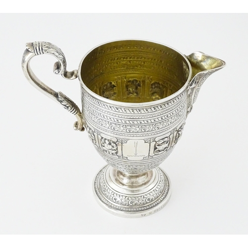 464 - A Victorian Scottish silver jug with banded decoration and Zodiac symbols, hallmarked Edinburgh 1892... 