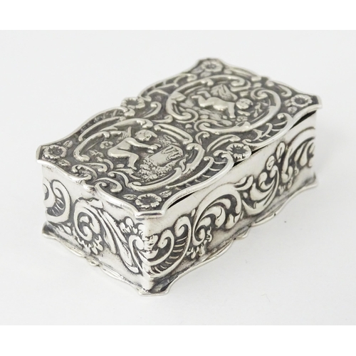 471 - A silver pill box with embossed decoration hallmarked Birmingham 1972, maker Joseph Gloster Ltd. App... 