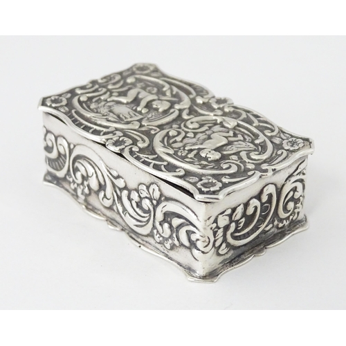 471 - A silver pill box with embossed decoration hallmarked Birmingham 1972, maker Joseph Gloster Ltd. App... 