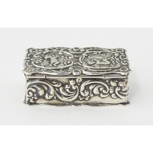 471 - A silver pill box with embossed decoration hallmarked Birmingham 1972, maker Joseph Gloster Ltd. App... 