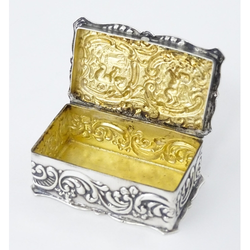 471 - A silver pill box with embossed decoration hallmarked Birmingham 1972, maker Joseph Gloster Ltd. App... 