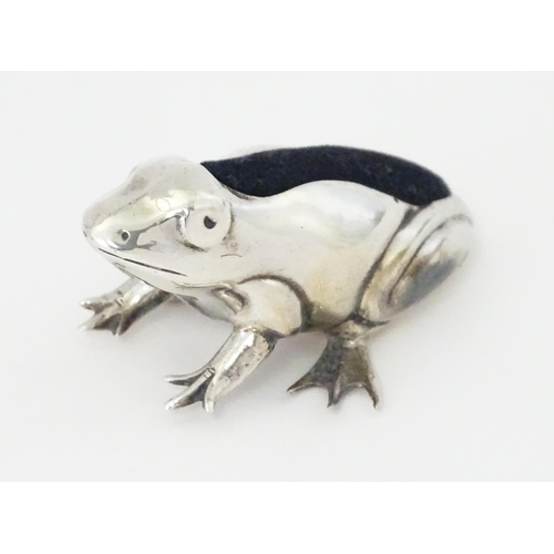 471A - A silver novelty pin cushion formed as a frog hallmarked Birmingham, maker CME Jewellery Ltd. Approx... 