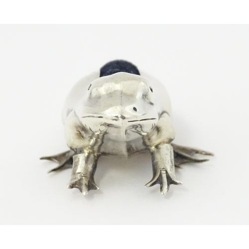 471A - A silver novelty pin cushion formed as a frog hallmarked Birmingham, maker CME Jewellery Ltd. Approx... 