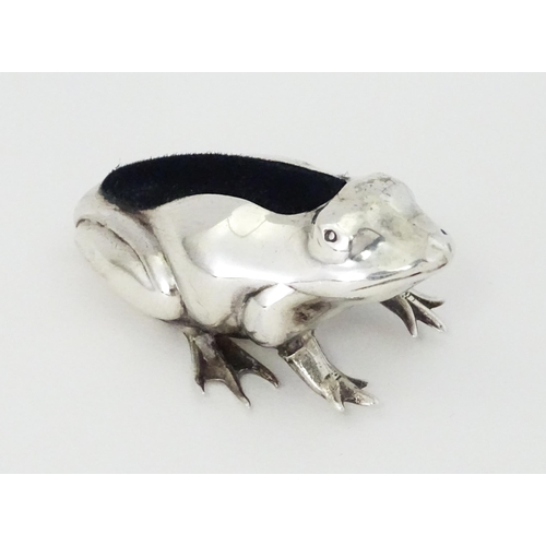 471A - A silver novelty pin cushion formed as a frog hallmarked Birmingham, maker CME Jewellery Ltd. Approx... 