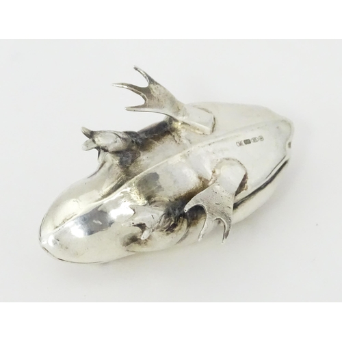 471A - A silver novelty pin cushion formed as a frog hallmarked Birmingham, maker CME Jewellery Ltd. Approx... 