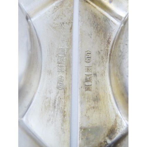 478 - A pair of silver ashtrays with engine turned decoration hallmarked Birmingham 1961, maker Lansen Ltd... 