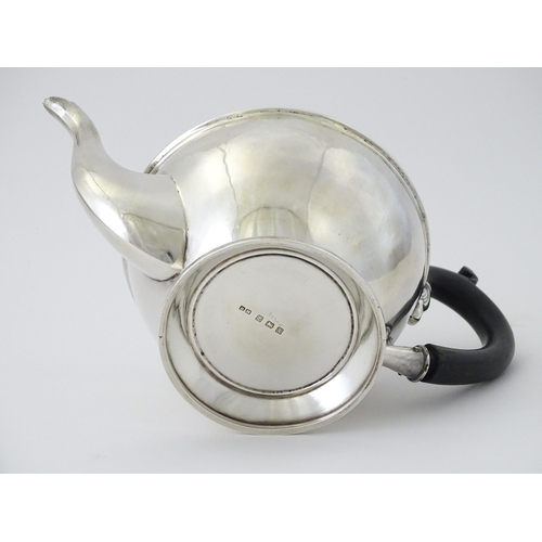 486 - A silver teapot hallmarked Birmingham 1922, maker Henry Matthews. Approx. 5