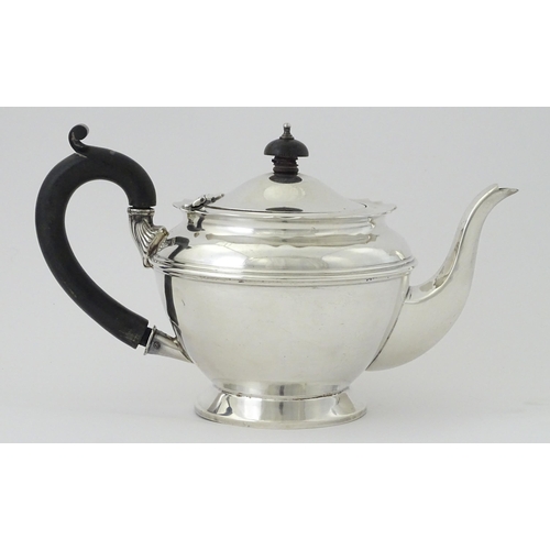 486 - A silver teapot hallmarked Birmingham 1922, maker Henry Matthews. Approx. 5