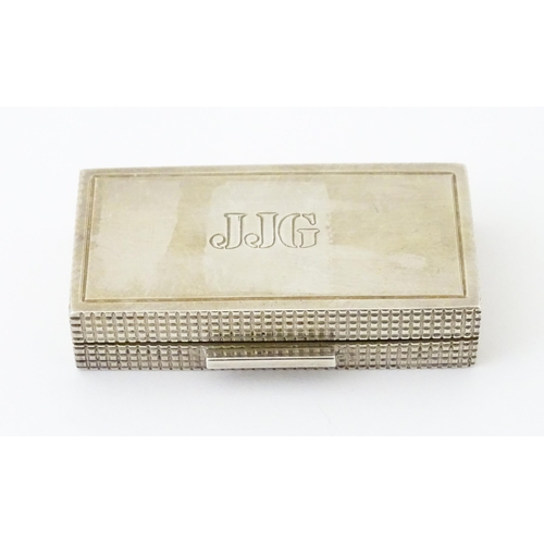 498 - A small silver box with engine turned decoration and gilded interior, hallmarked Birmingham 1988, ma... 