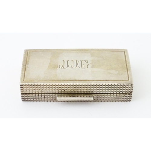 498 - A small silver box with engine turned decoration and gilded interior, hallmarked Birmingham 1988, ma... 