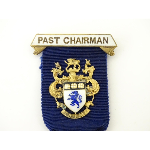 505 - A silver gilt Round Table jewel / medal with enamel decoration, titled Past Chairman, with motto 'Ad... 