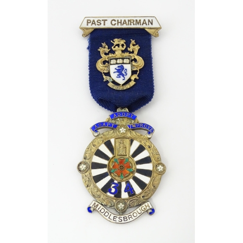 505 - A silver gilt Round Table jewel / medal with enamel decoration, titled Past Chairman, with motto 'Ad... 