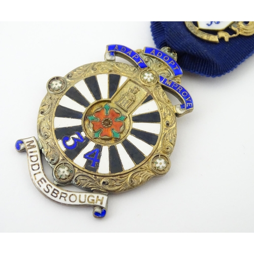 505 - A silver gilt Round Table jewel / medal with enamel decoration, titled Past Chairman, with motto 'Ad... 