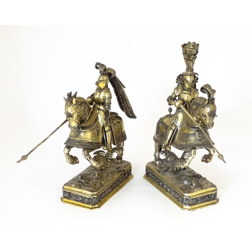 369 - A pair of silver gilt jousting knights on horseback, bearing marks probably for Neresheimer, Hanau, ... 