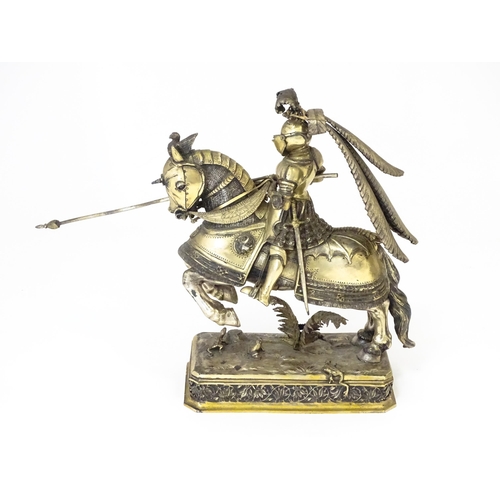 369 - A pair of silver gilt jousting knights on horseback, bearing marks probably for Neresheimer, Hanau, ... 