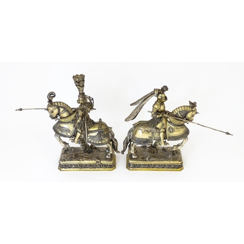 369 - A pair of silver gilt jousting knights on horseback, bearing marks probably for Neresheimer, Hanau, ... 