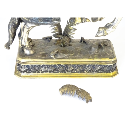 369 - A pair of silver gilt jousting knights on horseback, bearing marks probably for Neresheimer, Hanau, ... 