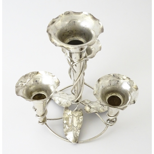 593 - An Art Nouveau silver plate centrepiece epergne with four flutes and foliate detail. Approx. 8