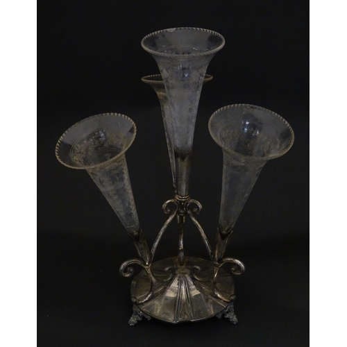 594 - A silver plate centrepiece epergne with four glass flutes. Approx. 12 1/2