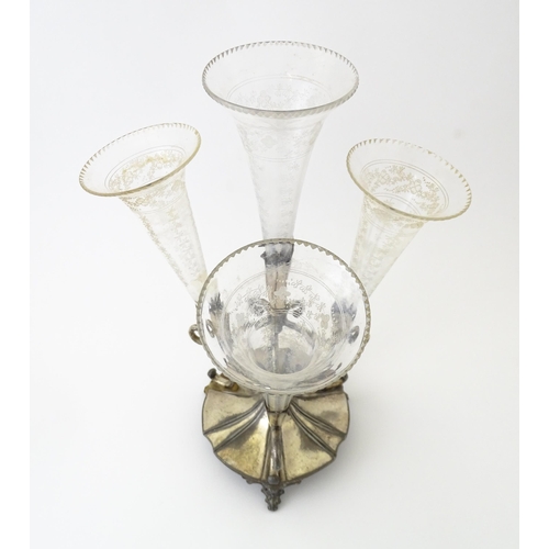 594 - A silver plate centrepiece epergne with four glass flutes. Approx. 12 1/2