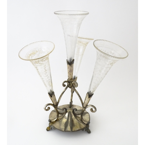 594 - A silver plate centrepiece epergne with four glass flutes. Approx. 12 1/2