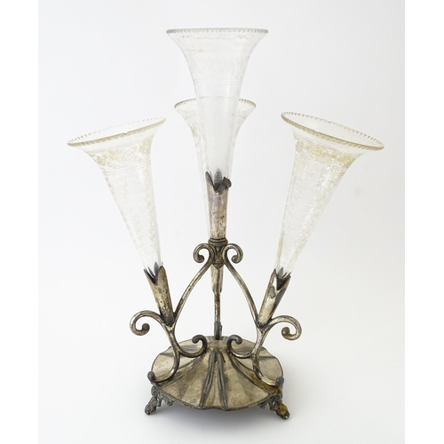 594 - A silver plate centrepiece epergne with four glass flutes. Approx. 12 1/2