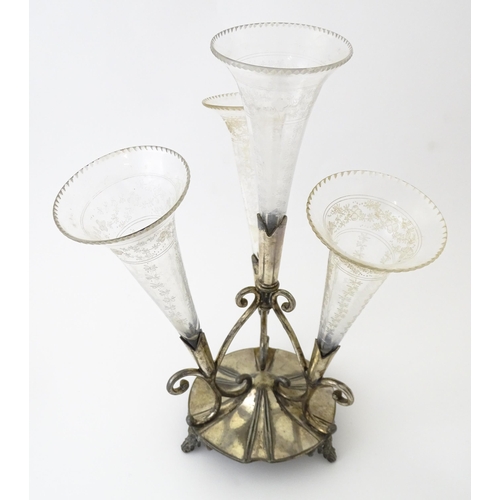 594 - A silver plate centrepiece epergne with four glass flutes. Approx. 12 1/2