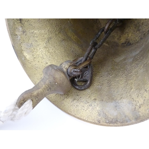 1087 - Nautical / Maritime Interest: A 20thC brass wall mounting ships bell. Approx. 6 1/2