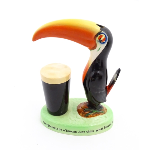 1102 - A 20thC Carlton Ware Guinness advertising Toucan lamp base, titled How Grand to be a Toucan, Just th... 