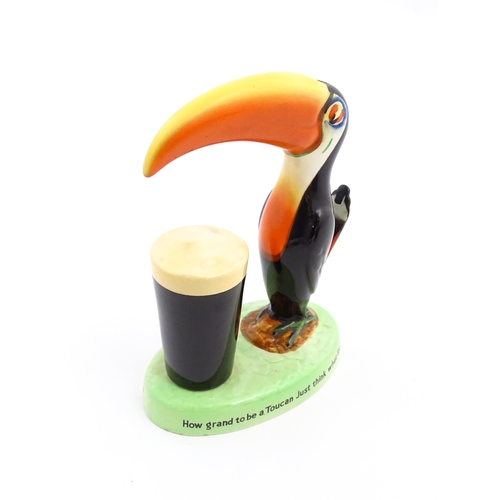 1102 - A 20thC Carlton Ware Guinness advertising Toucan lamp base, titled How Grand to be a Toucan, Just th... 