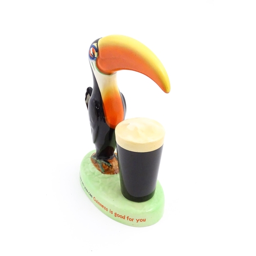 1102 - A 20thC Carlton Ware Guinness advertising Toucan lamp base, titled How Grand to be a Toucan, Just th... 