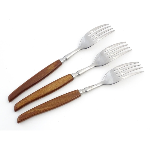 1115 - A vintage / retro Glosswood of Sheffield canteen of teak handled cutlery, comprising knives, forks a... 