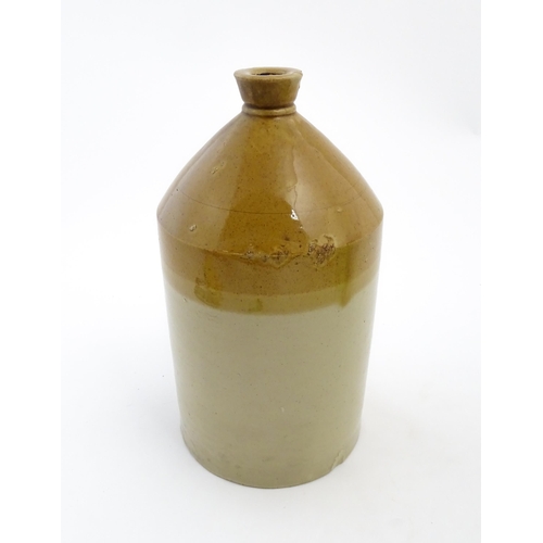 1117 - A Victorian two tone stoneware flagon marked 1886 Charles Foster Wine & Spirit Merchant Oxford. Appr... 