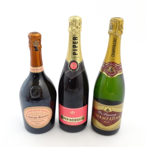 1122 - Three 750ml bottles of champagne, comprising Laurent-Perrier rosé , Piper-Heidsieck rosé and De Laur... 