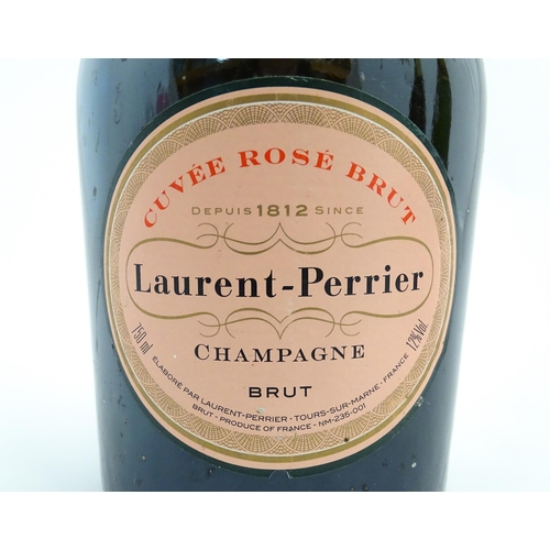 1122 - Three 750ml bottles of champagne, comprising Laurent-Perrier rosé , Piper-Heidsieck rosé and De Laur... 