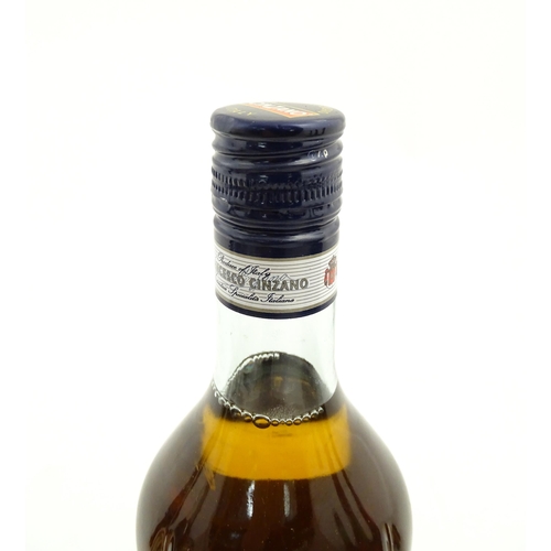 1127 - A 75cl bottle of Pedro Ximenez Triana Bodegas Hidalgo sherry, together with a 75cl bottle of Cinzano... 