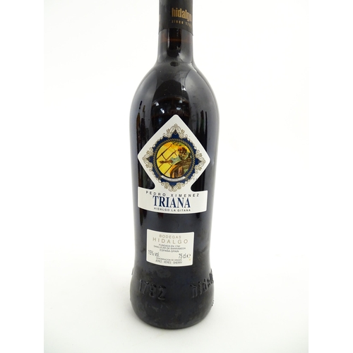 1127 - A 75cl bottle of Pedro Ximenez Triana Bodegas Hidalgo sherry, together with a 75cl bottle of Cinzano... 