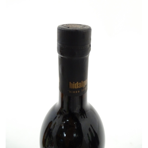 1127 - A 75cl bottle of Pedro Ximenez Triana Bodegas Hidalgo sherry, together with a 75cl bottle of Cinzano... 