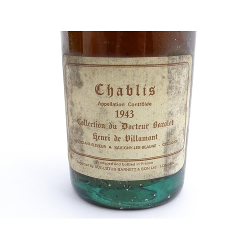 1129 - Seven bottles of vintage red wine, comprising a 1966 75cl bottle of Chateau Haut-Brion, two 1969 75c... 