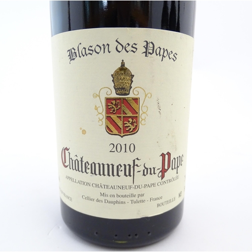 1133 - Seven bottles of red wine, comprising: a 2000 750ml bottle of Demon Rouge Fleurie, a 2008 75cl bottl... 